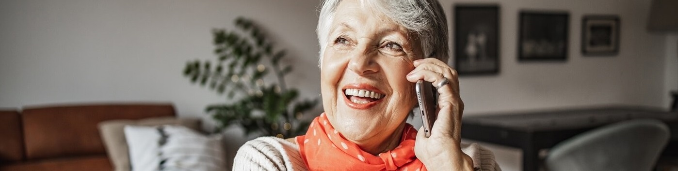 photo of woman talking on telephone.