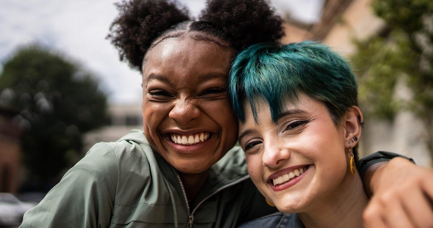 Photo of two smiling people.