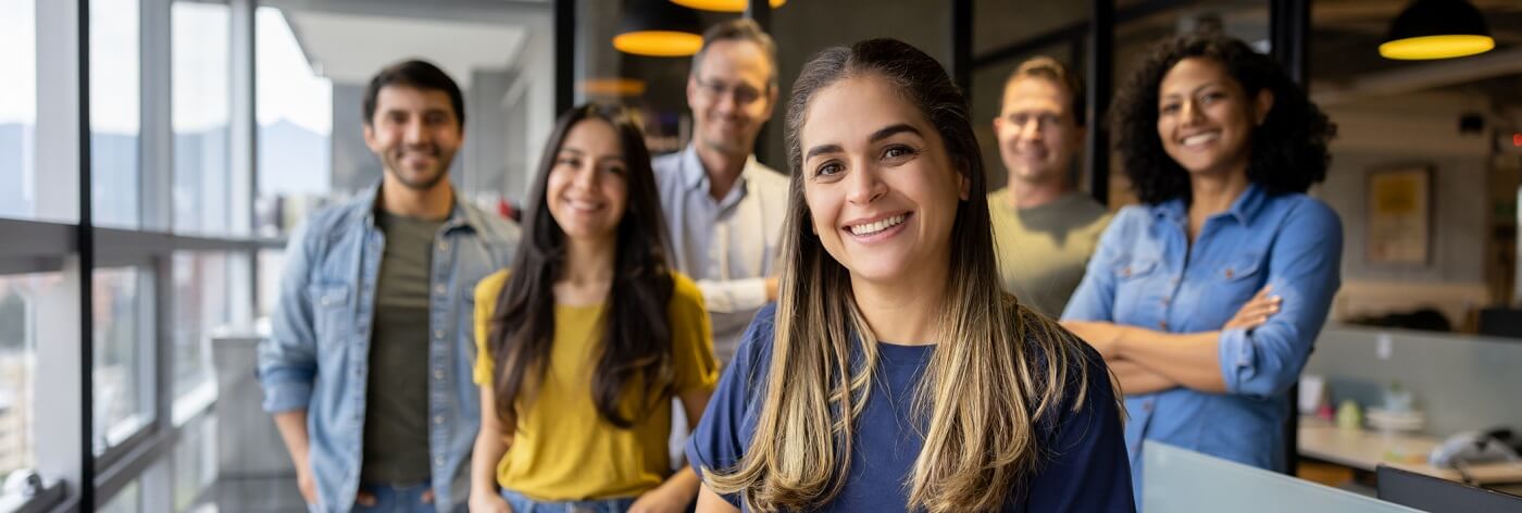 Group of coworkers in casual office setting.
