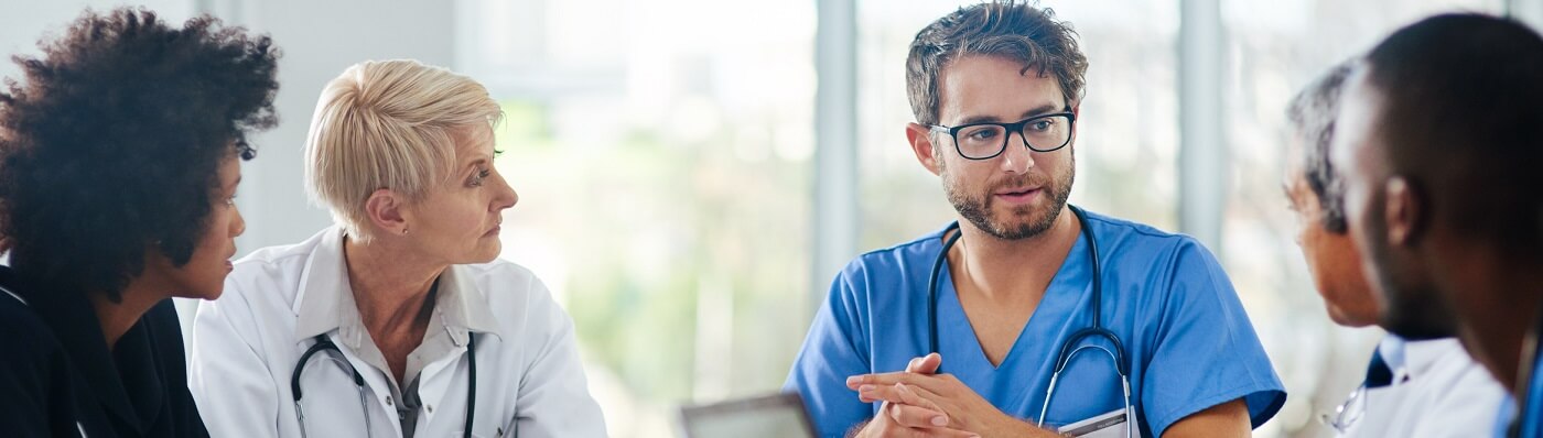 Health care providers discussing patient care