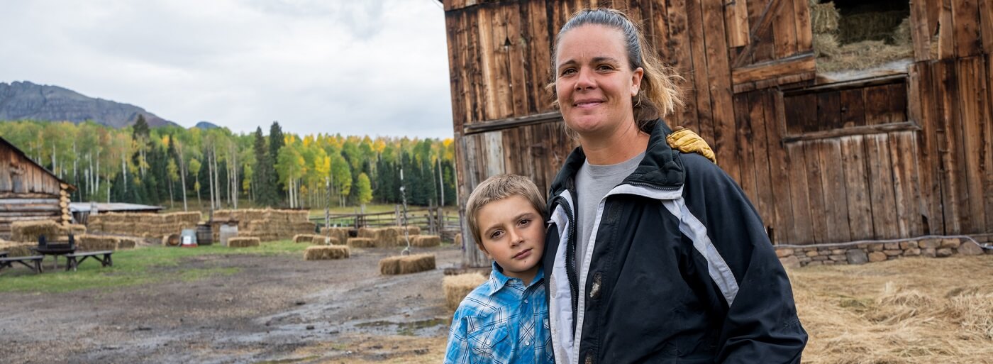 Photo of a mother and son on Colorado farm.