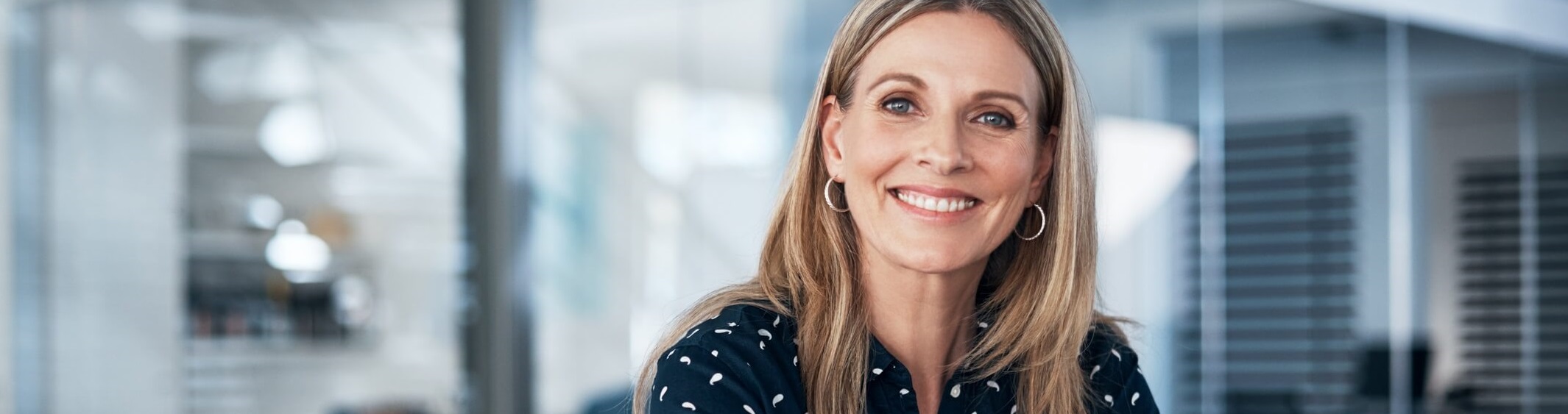 Woman with friendly, open smile.