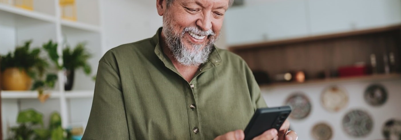 Senior man using smartphone