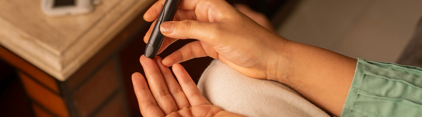 Person doing diabetic testing