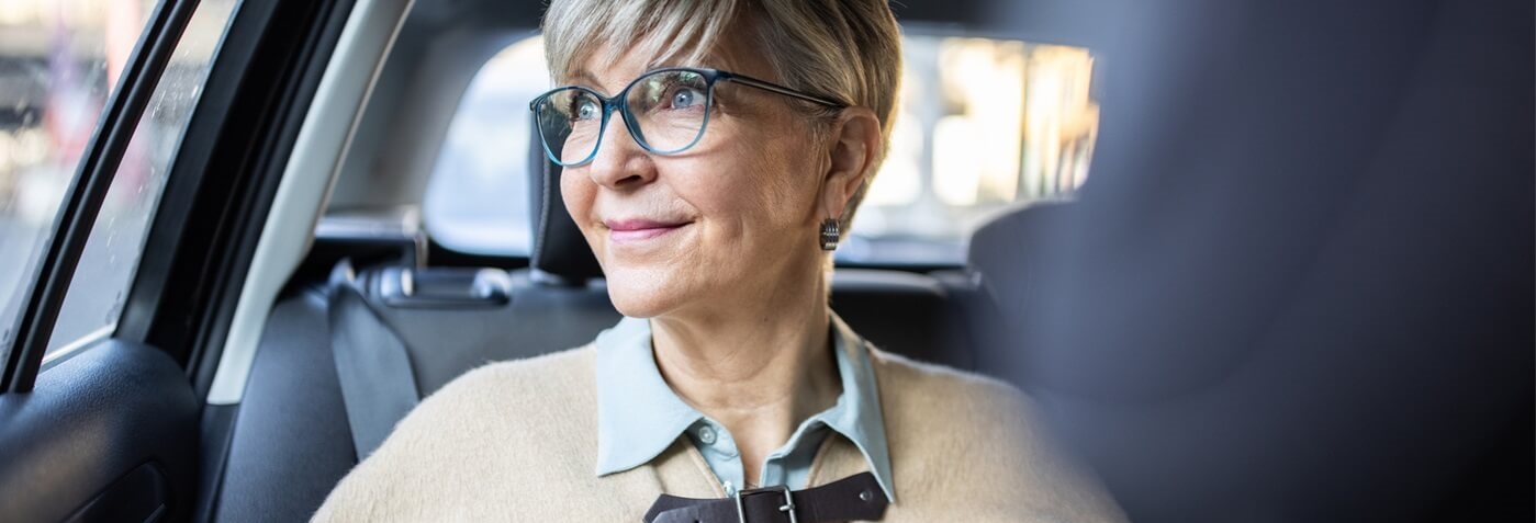 Senior woman getting ride to doctor appointment