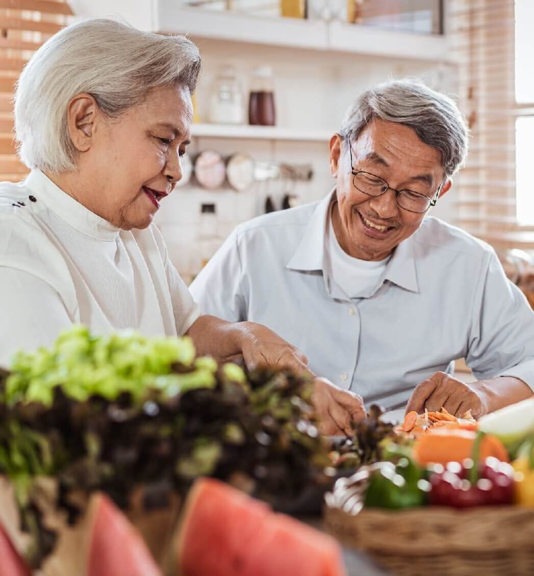 Photo of couple preparing healthy food