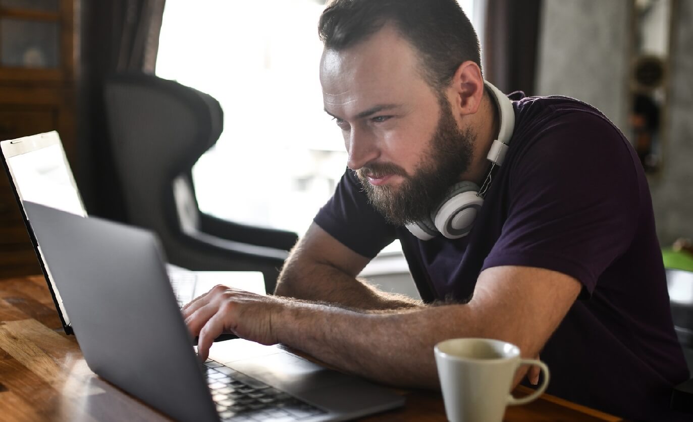 Photo of man looking up his pharmacy info in Pharmacy Portal.