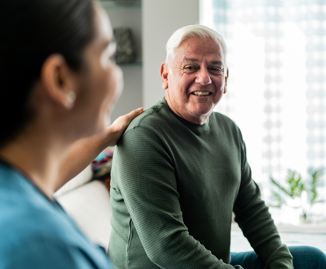 Senior man with health care provider