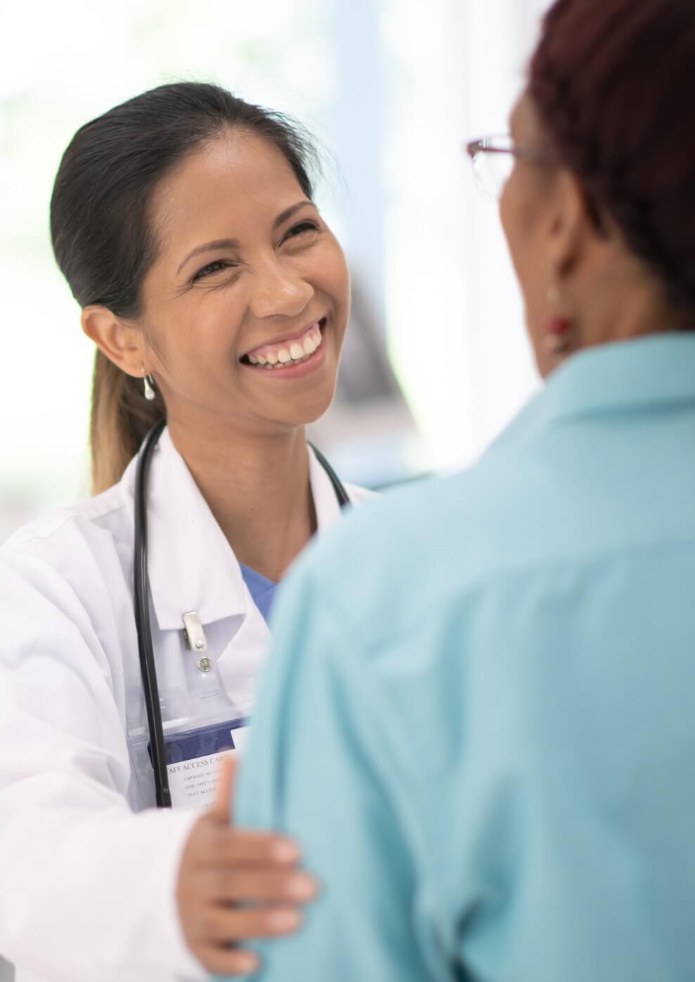 Health care provider encouraging patient