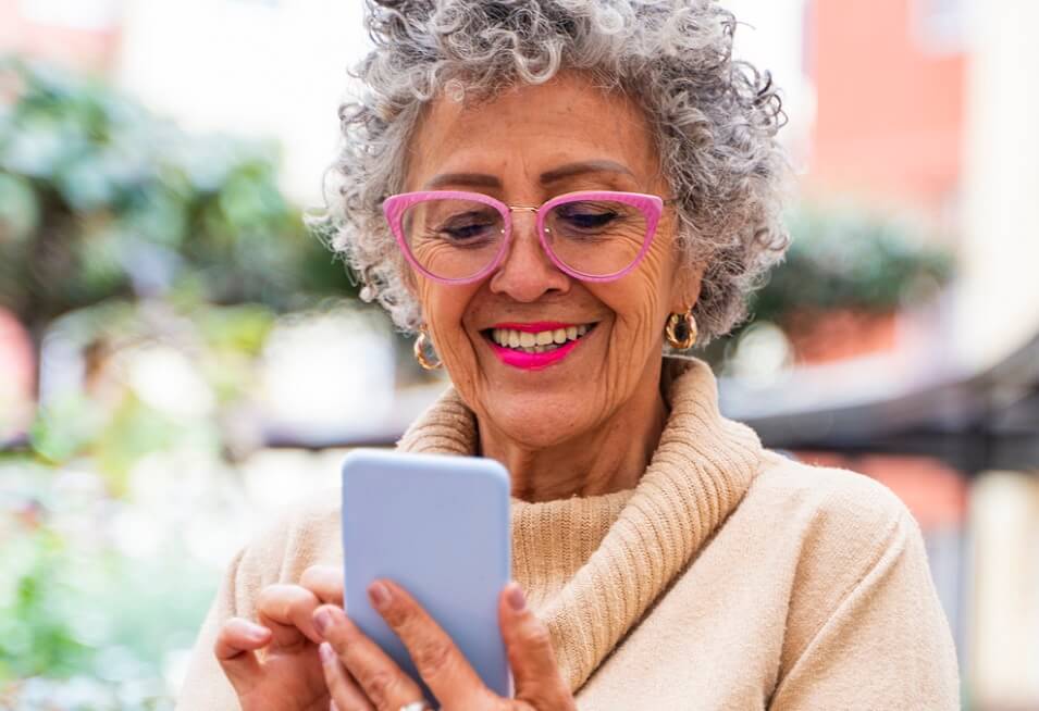 Woman accessing information on smartphone.