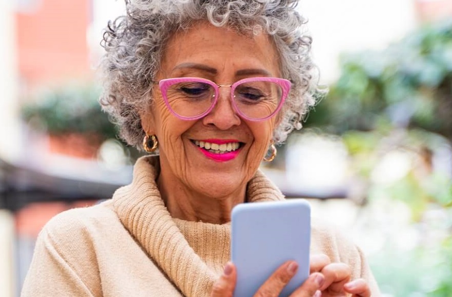 Woman accessing information on smartphone.