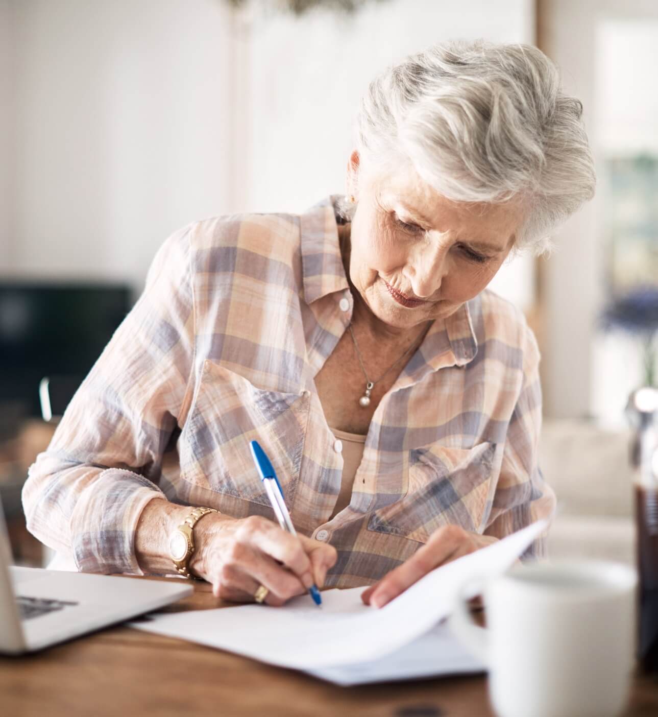 Photo of woman ordering product from OTC catalog.