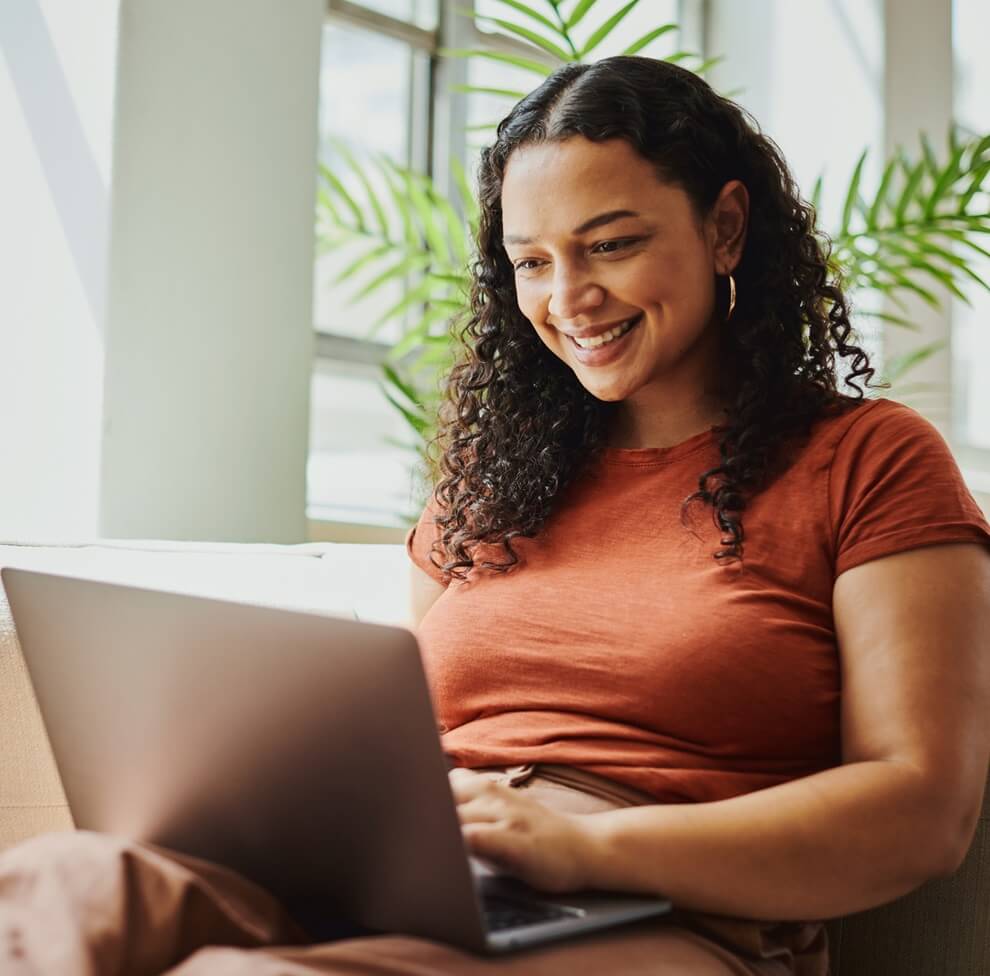 Young woman using laptop.