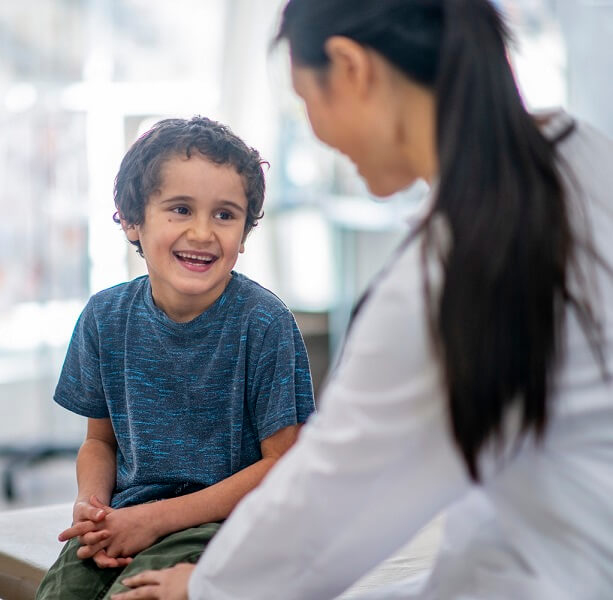 Photo of smiling little boy at doctor's office