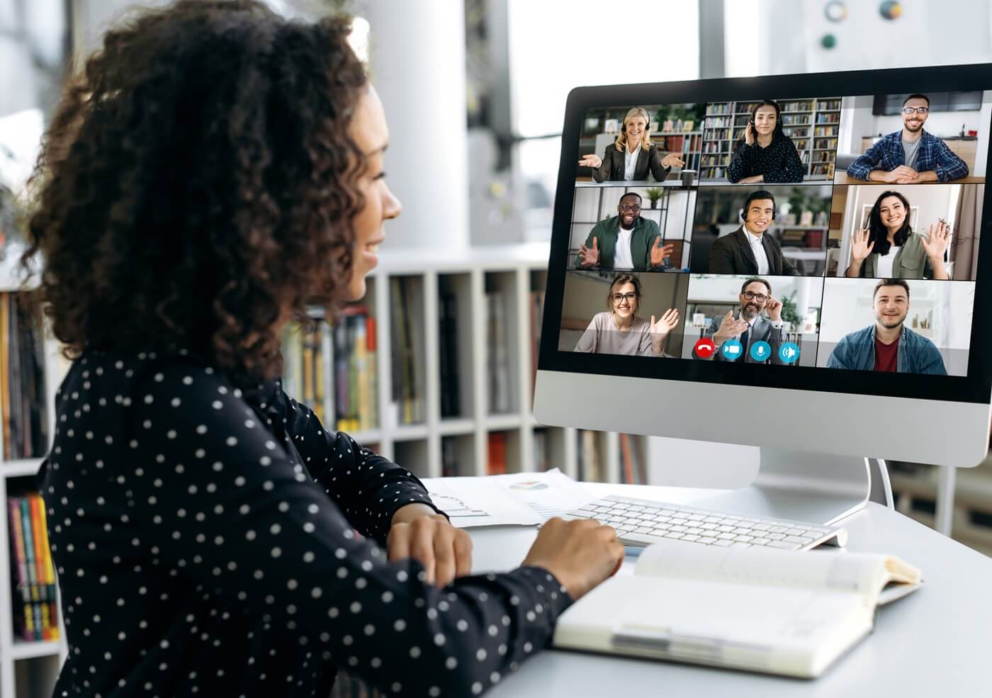 Woman attending a webinar meeting on her computer.