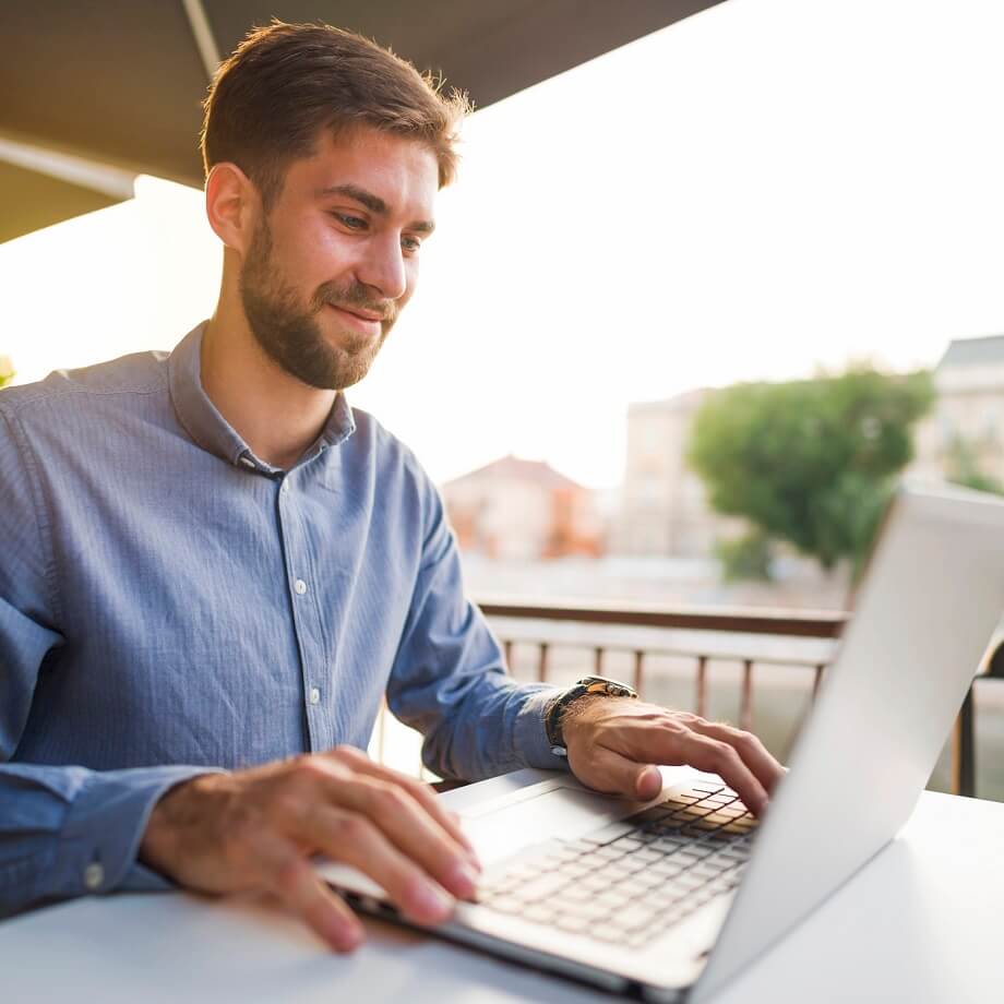 Young man on laptop.