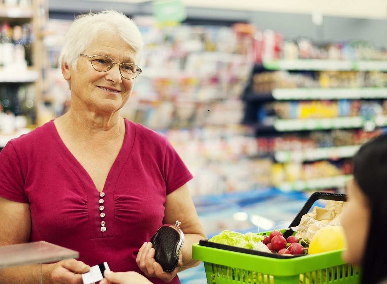 Photo of woman making a purchase with her FlexCard.