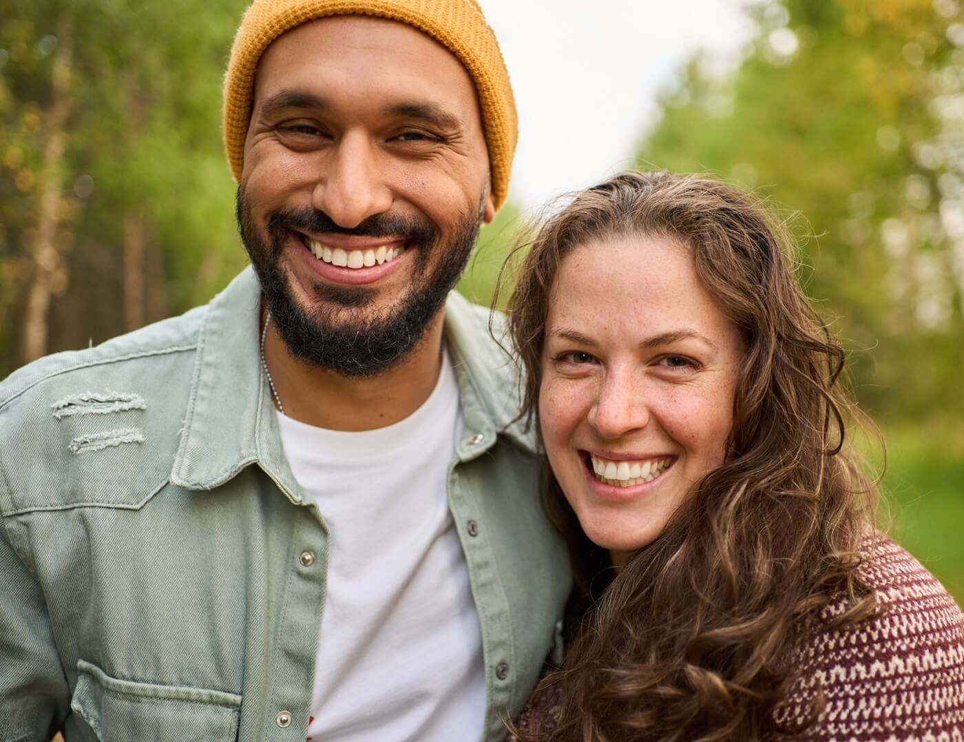 smiling young adult couple