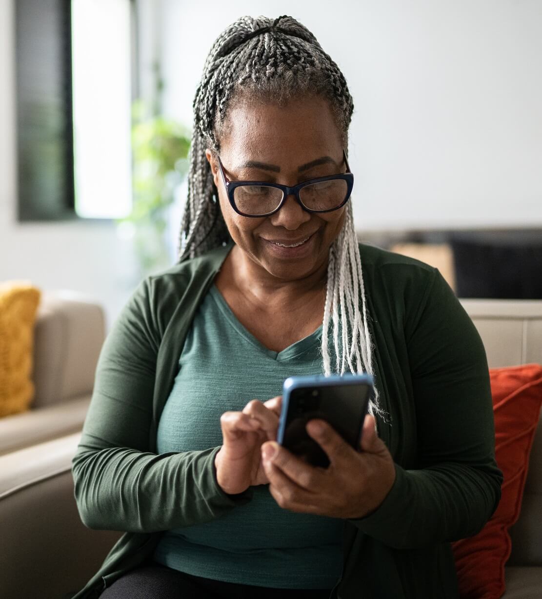 Woman looking at mobile phone.