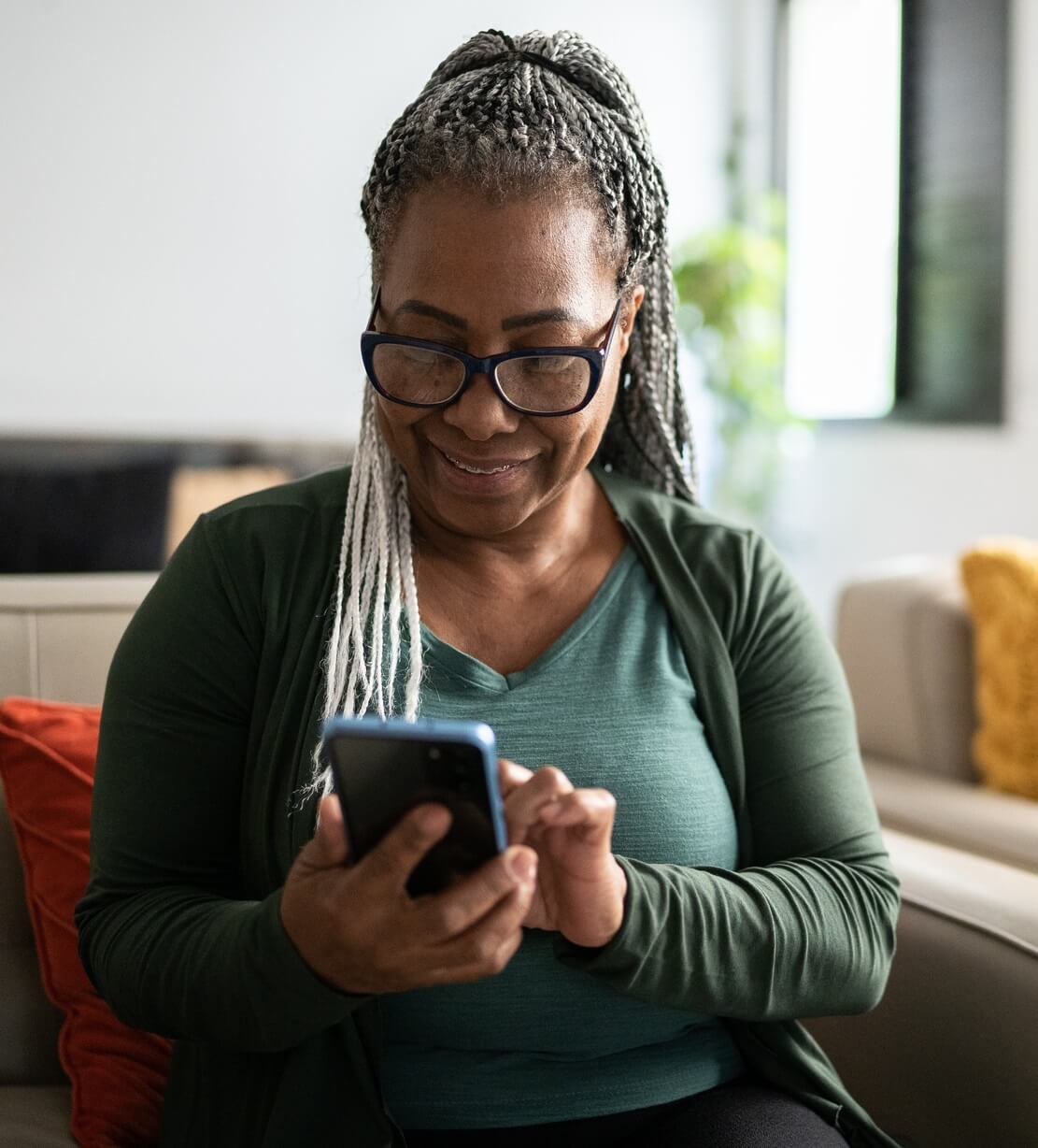 Woman looking at mobile phone.