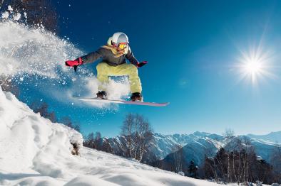 Woman snowboarding