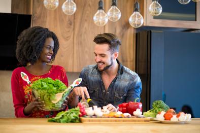 Couple making a salad