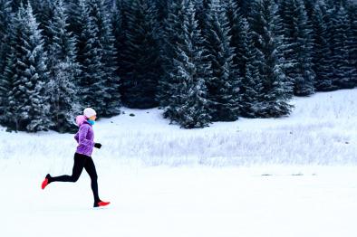 Woman running in wintertime