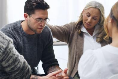 several people participating in a group therapy session