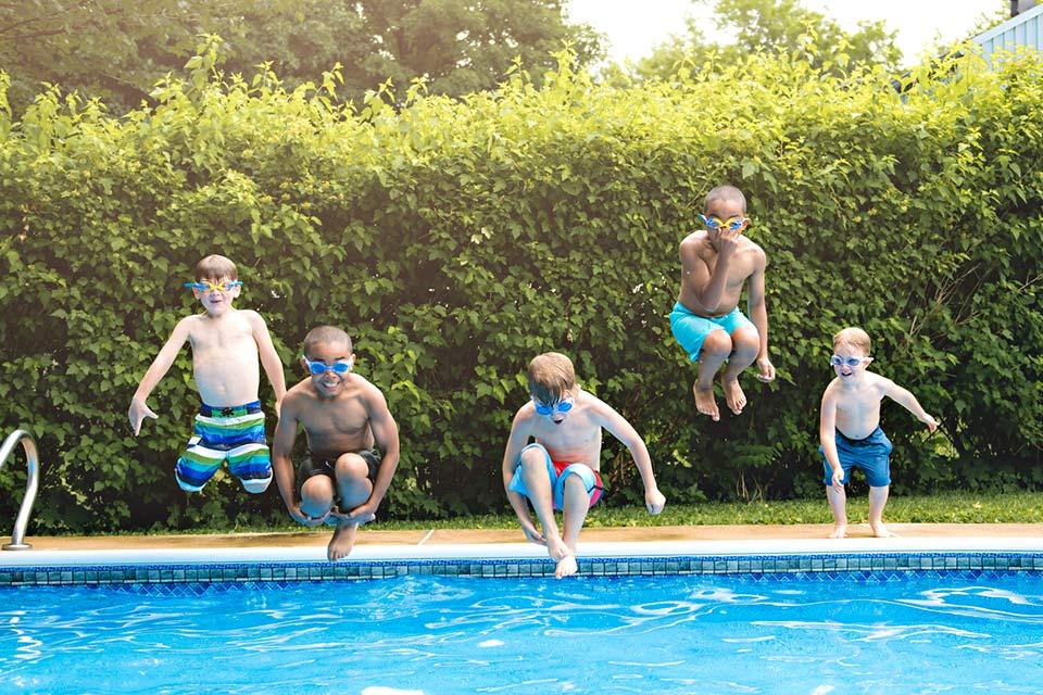 Kids Jumping in a pool