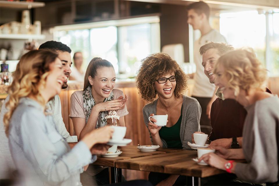 People laughing at a table