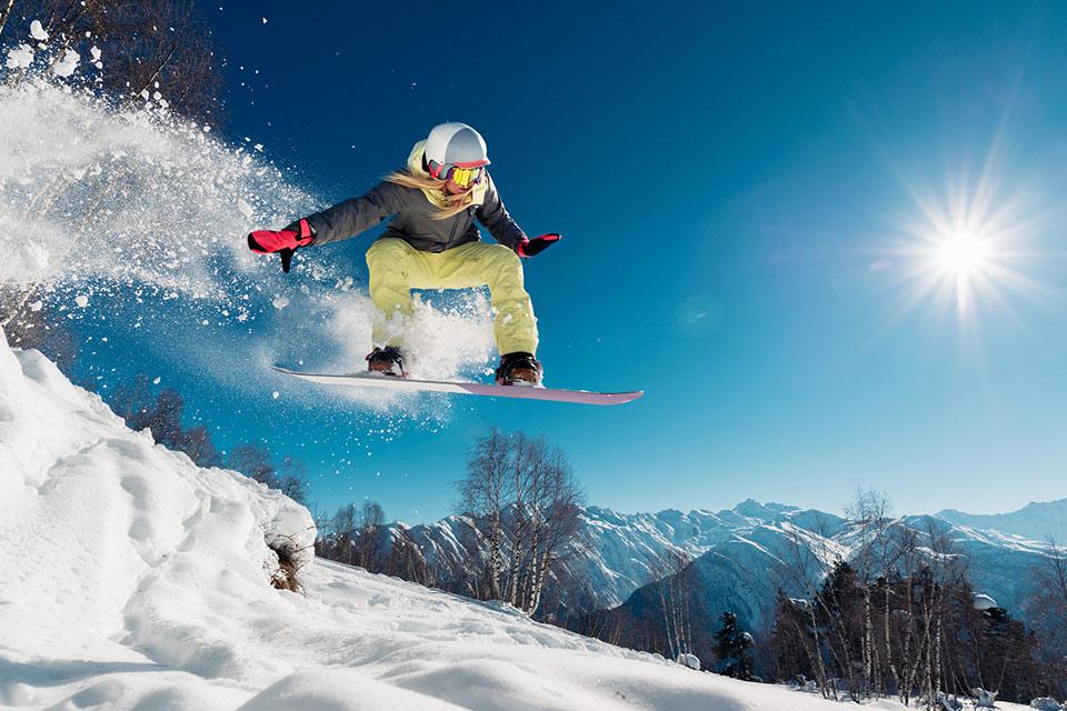 Woman snowboarding