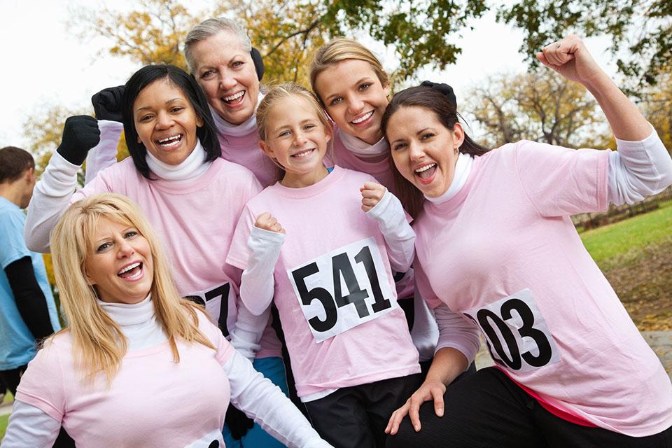 Women celebrating breast cancer awareness
