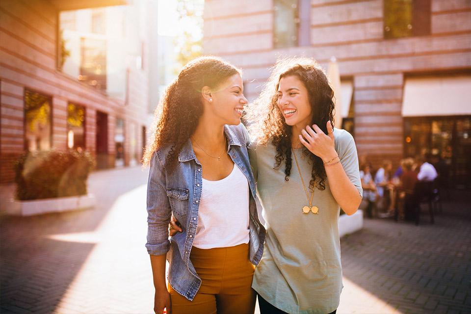 two women laughing