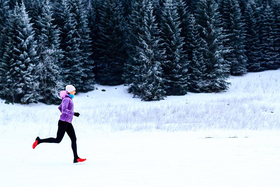 Woman running in wintertime