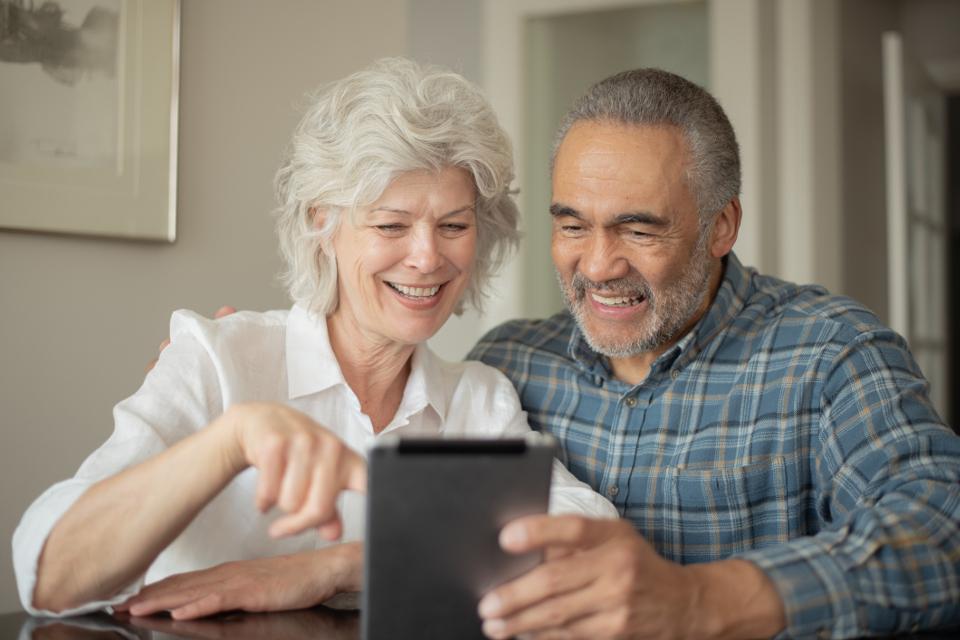 Grandparents video chatting with family