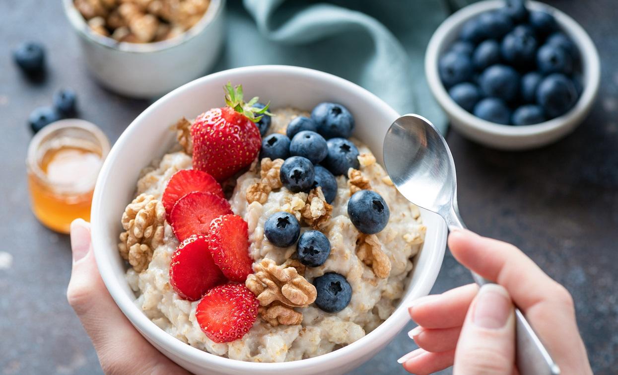 Bowl of oatmeal and fruit.