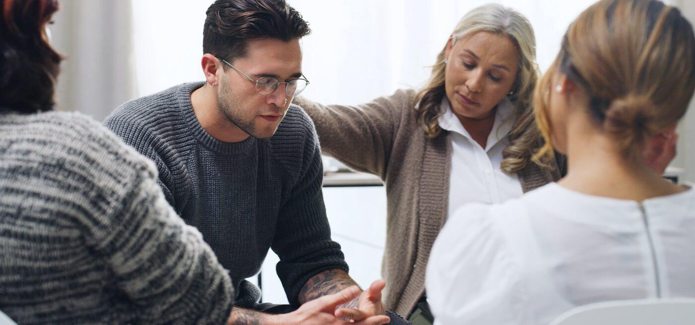 several people participating in a group therapy session