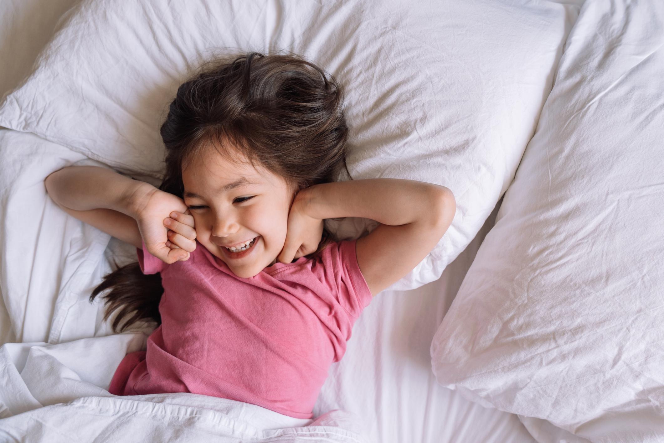 girl-waking-up-in-bed